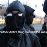 The Vultures Under the Veil: Unmasking the Cowardice Behind the Black Bloc